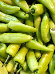 photo of green chili pepper on the counter supermarket