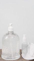 Image of medical surgical masks and alcohol sanitizer hand gel for cleaning hygiene y protection antibacterial