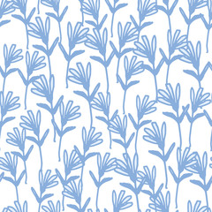 Fototapeta na wymiar Blue little forest flowers seamless pattern on white background. Abstract field of flowers wallpaper.