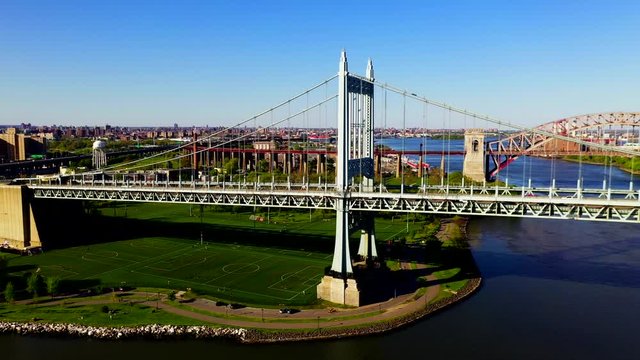 Aerial Pan Shot of the RFK and the Hell Gate Bridge Over the East River - Part 2
