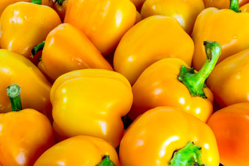 Yellow bell peppers pattern background
