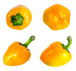 Set of yellow bell peppers isolated on white background