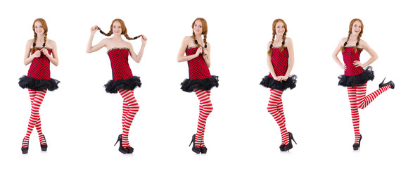 Redhead girl in red dress and stockings on white
