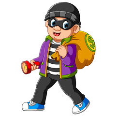 Thief man with flashlight in his hand