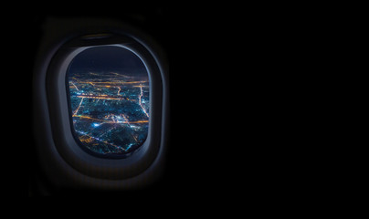 night cityscape from airplane window