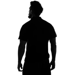Silhouette of male person , back view back lit over white