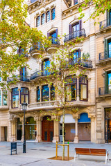 Classical vintage architecture on the streets of Europe. Front view of multiple story building with...
