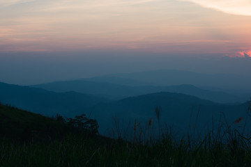 The sky and the mountains alternate after the sun sets.