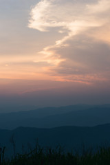The sky and the mountains alternate after the sun sets.