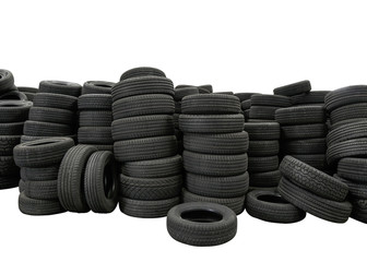 Pile of tires isolated on white background, new car tyres product in manufacturing factory