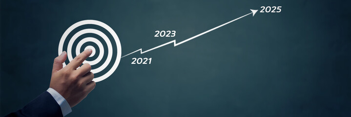 hand finger press on goal target with stair of way to success in 2021