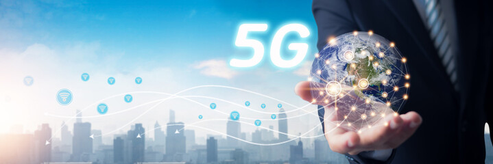 5G access and technology over city, social communication and online digital concept, businessman holding global network