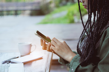 woman use smartphone working,playing with happy.