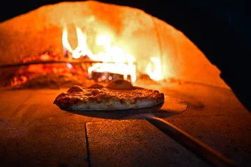 Fotobehang rustic pizza in wood fired oven © .shock