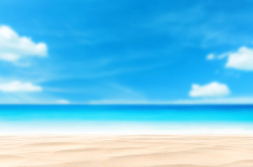 Blur tropical beach with bokeh sun light wave abstract background.