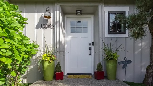 Departing from an American colonial style house; 4k dolly shot