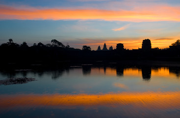 The silhouette of the Angkor Wat temple at sunrise with copy space, Siem Reap, Cambodia.