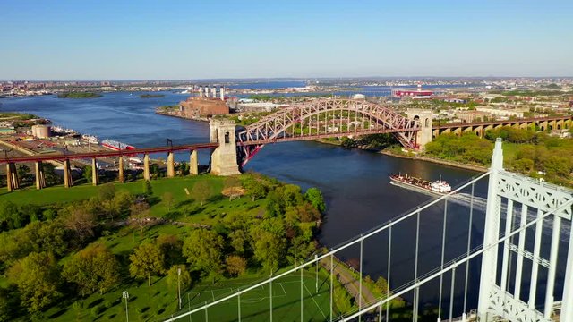 Aerial View of a Tanker Ship Approaching the Hell Gate Bridge