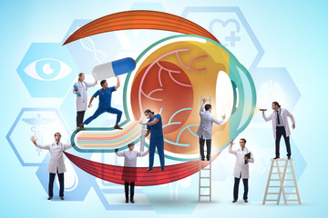 Fototapeta premium Doctor examining giant eye in medical concept