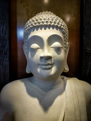 stone sculpture of lord buddha closed up