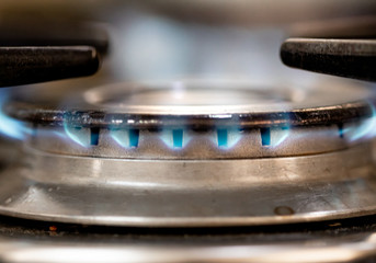 The stove. Gas burner in close-up ( Gás de Cozinha queimando - Fogão ). Gás, Combustível, Fogo.