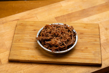 Meat cutlet for burger on a blackboard