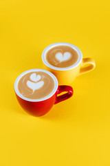 image of coffee cup on yellow background. Copy space