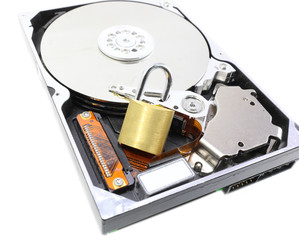 hard disk for data storage and an open padlock