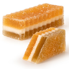 Two marmalade fruit candies on white background