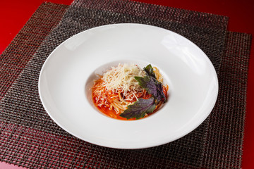 Italian pasta, noodles, preparing a dish in a cabin in a restaurant