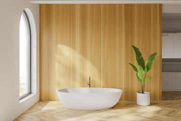 Obraz na płótnie Canvas Arched white and wooden bathroom with tub