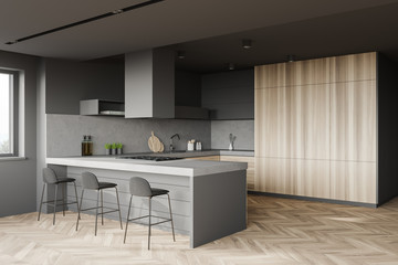 Gray and wood kitchen corner with bar