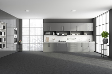 Gray kitchen with countertops and bookcase