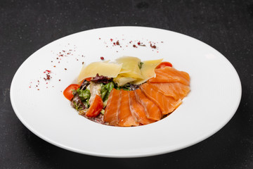 Vegetable and meat salad, classic salad for lunch in a restaurant
