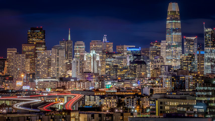 Fototapeta na wymiar Skyscrapers and freeways in San Francisco at night