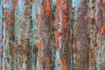 Vertical wavy pattern on corrugated metal sheet texture