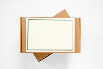Two cardboard boxes for parcels, one above the other, copy space for any text. Post delivery or...