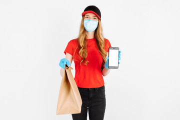 Happy courier with a phone. I look at the camera. isolated white background