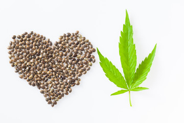 heart shaped medical cannabis seeds . marijuana leaf