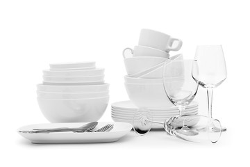 set clean dishes glasses on white