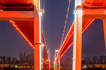 At night, two suspension bridges on the Yangtze River, Chongqing, China