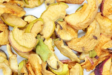 Beautiful dried apples located on a white background