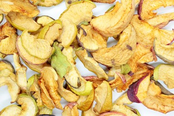 Beautiful dried apples located on a white background