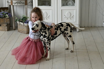 girl with Dalmatian dog