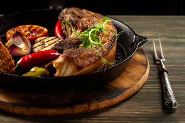 Fried meat in a pan.