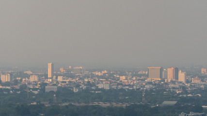 Looking from afar, Chiang Mai, Thailand is raining and the sky is dark.