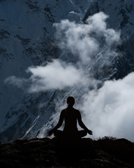 Serenity and yoga practicing at himalayas mountain range, meditation