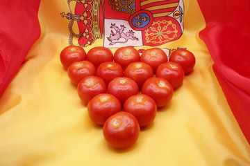 ball tomatoes, from the Spanish garden, on the flag of Spain, product photo,