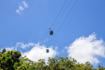 Skyrail Rainforest Cableway gondolas above the the rainforest near Kuranda in Tropical North Queensland, Australia