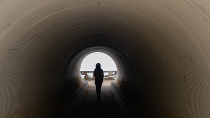 Girl in a tunnel